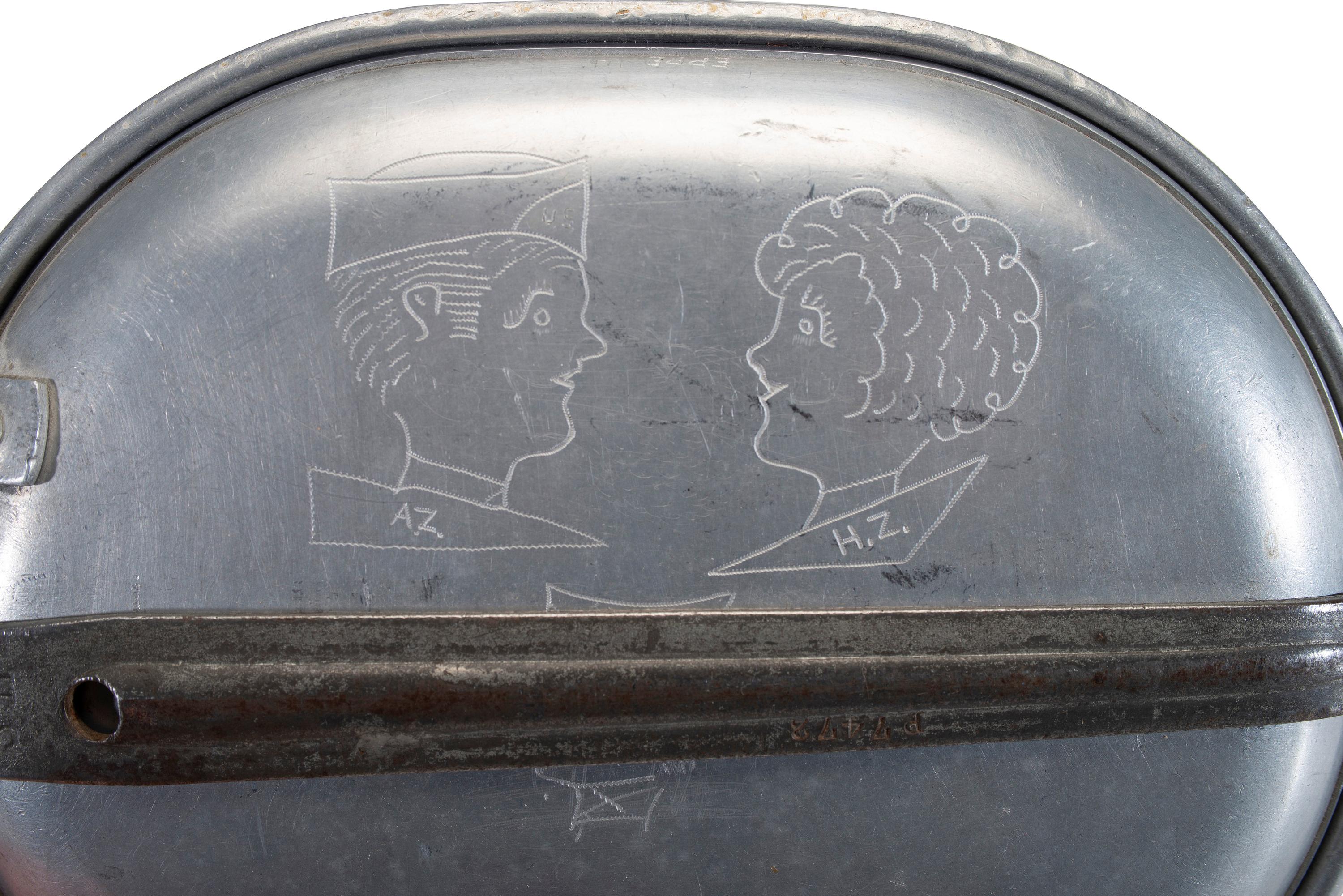 [MILITARIA]. World War II and Korean War-era canteens, canteen covers, and mess kits.