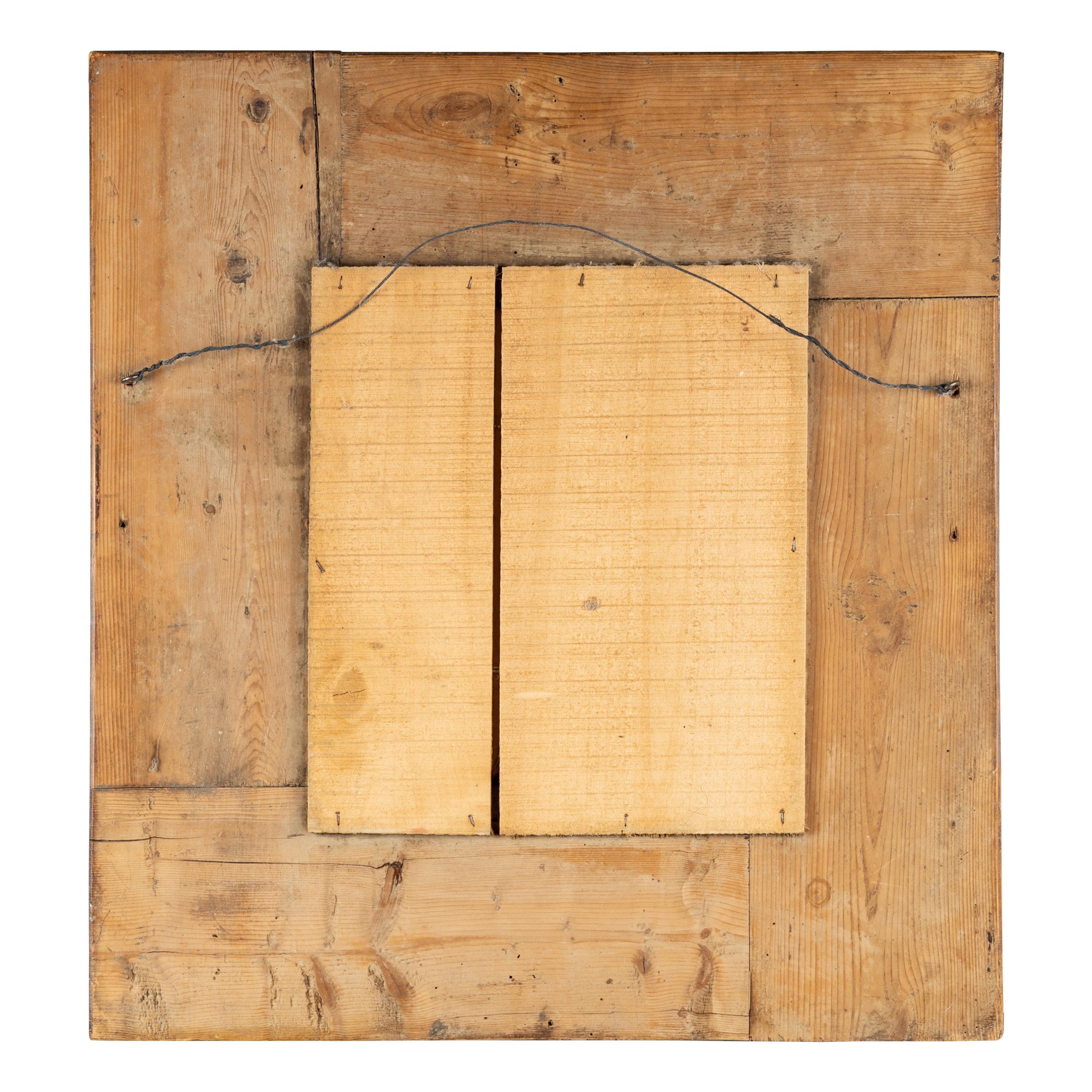 A Continental Walnut Mirror