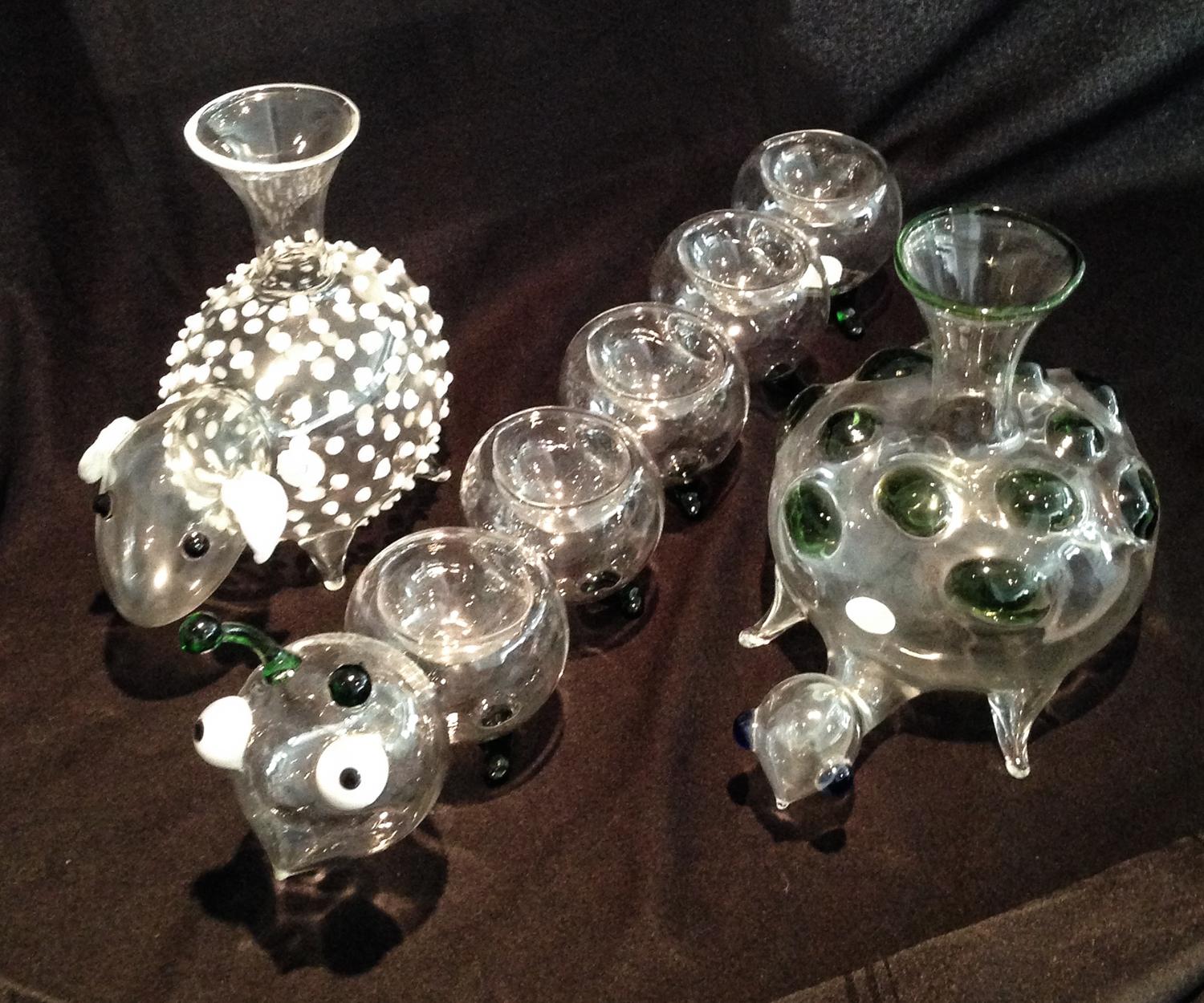 Three Blown Glass Animal Form Vases Length of longest 22 inches.