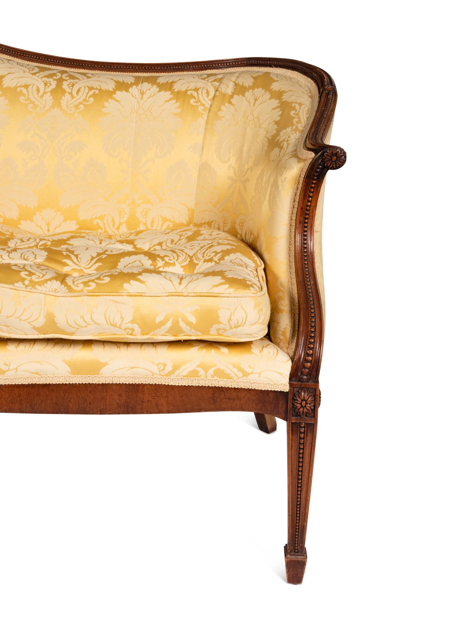 A Pair of George III Style Sofas