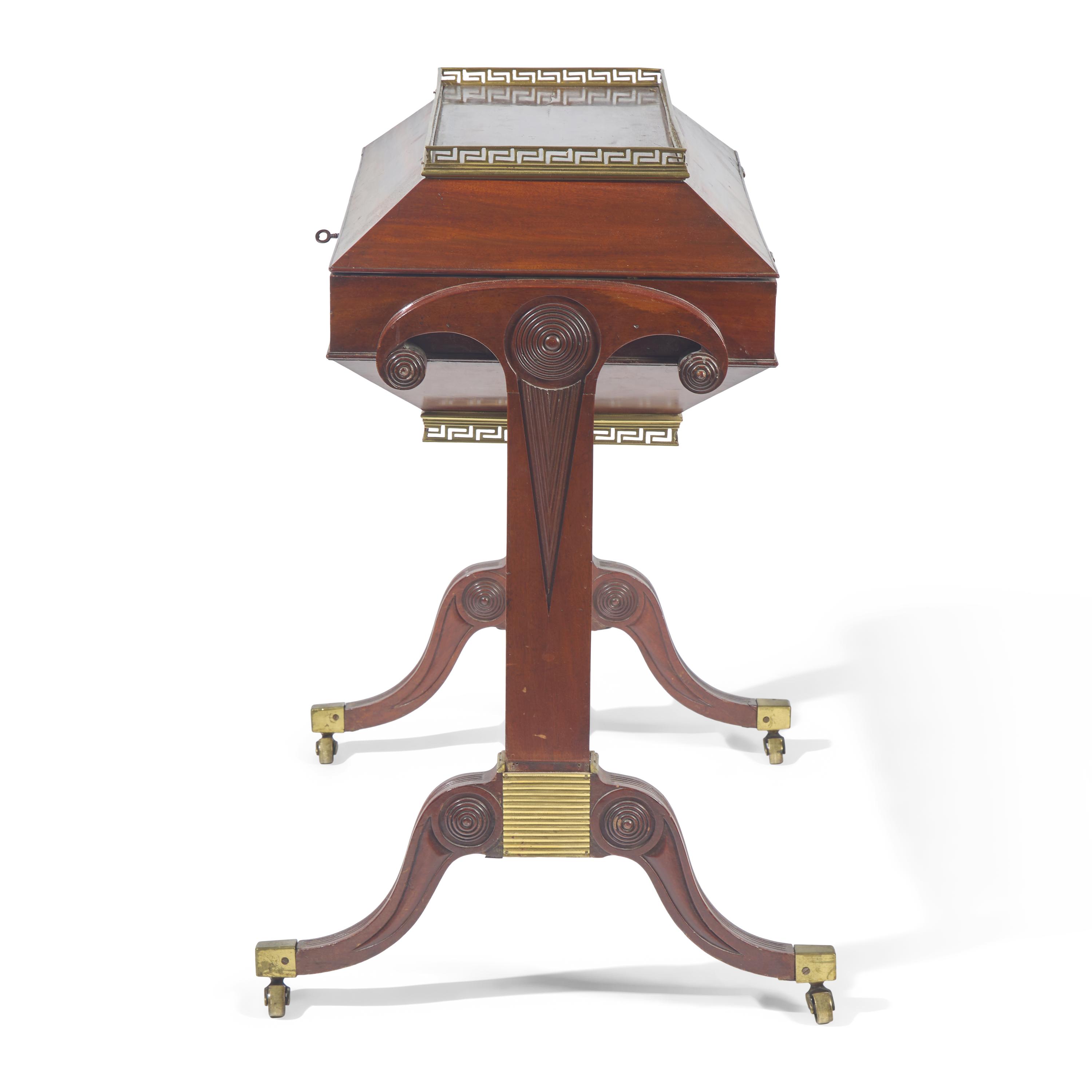 A Neoclassical Pierced Brass Mounted Mahogany Cellarette