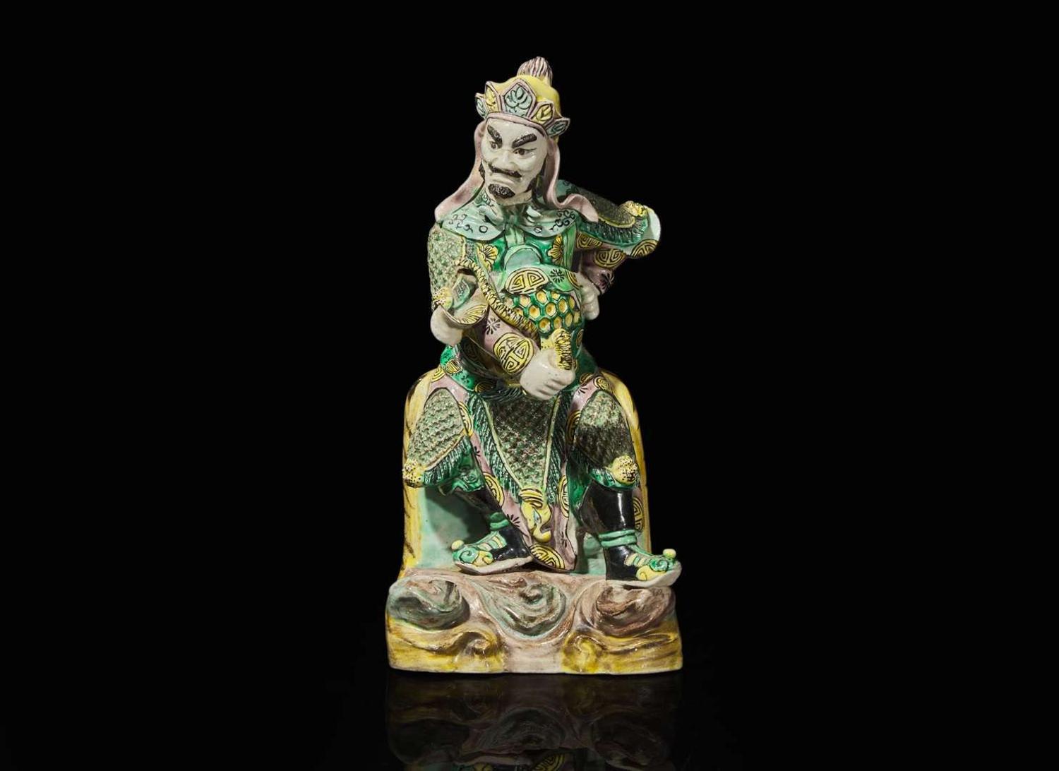 A Chinese famille verte figure of Guangmu Tianwang, guardian king of the West 素三彩造像一尊