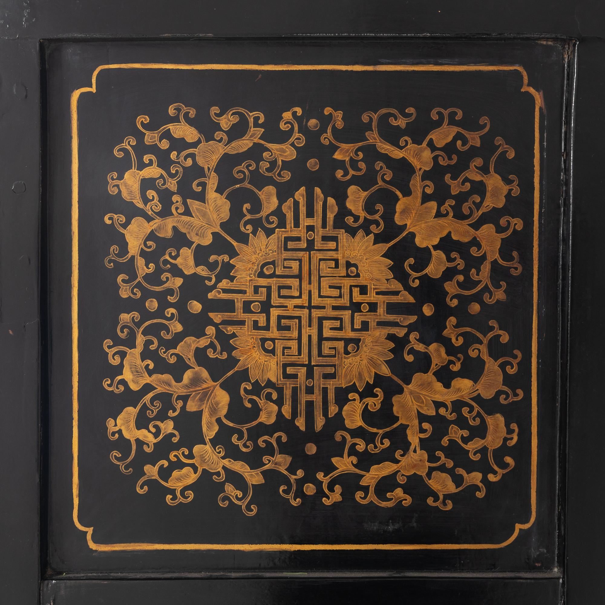 A Chinese Red Lacquer Cabinet
