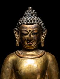 A Large Tibetan Gilt Bronze Figure of Seated Buddha