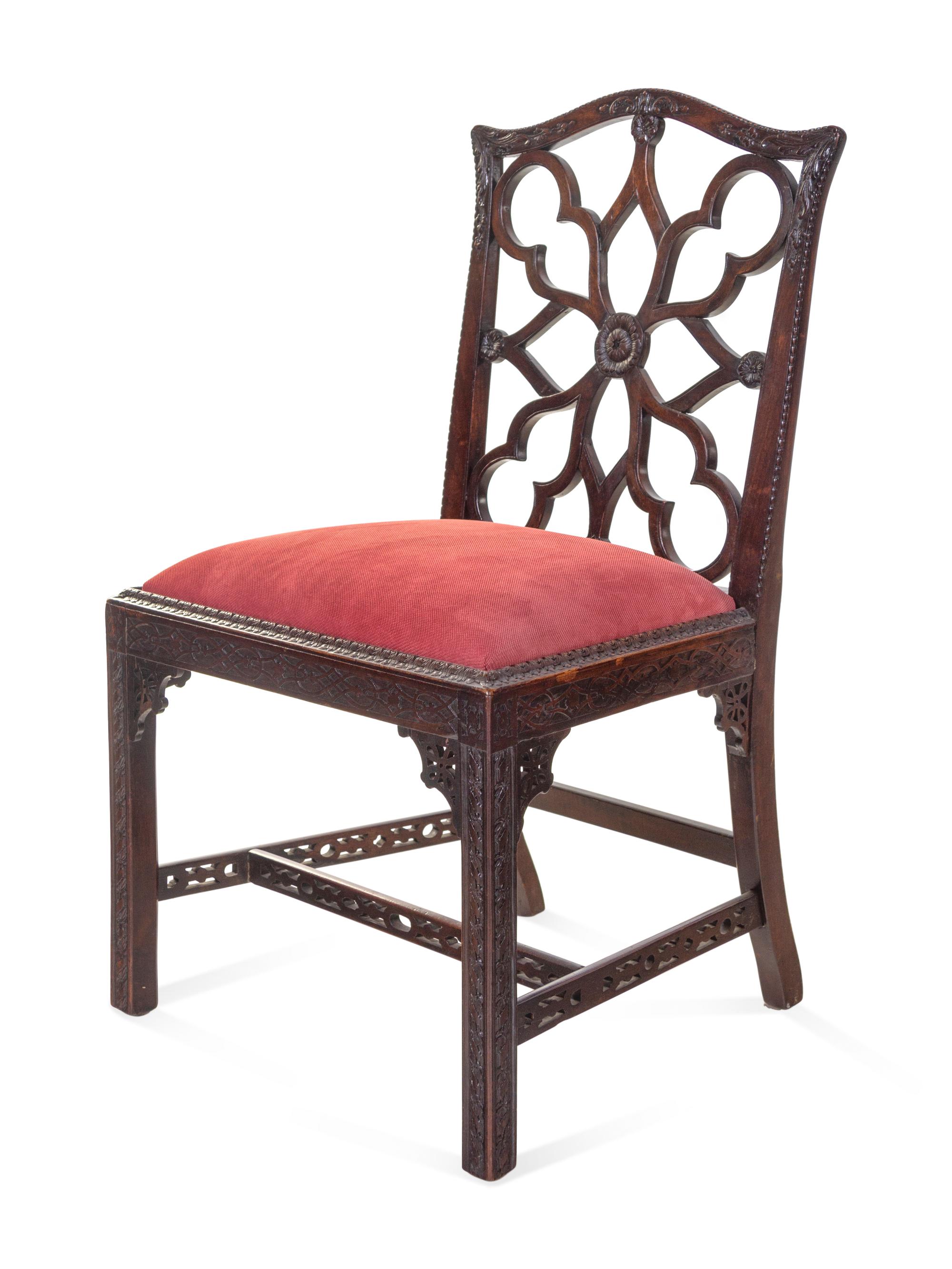 A Set of Four George III Mahogany “Gothick” Dining Chairs