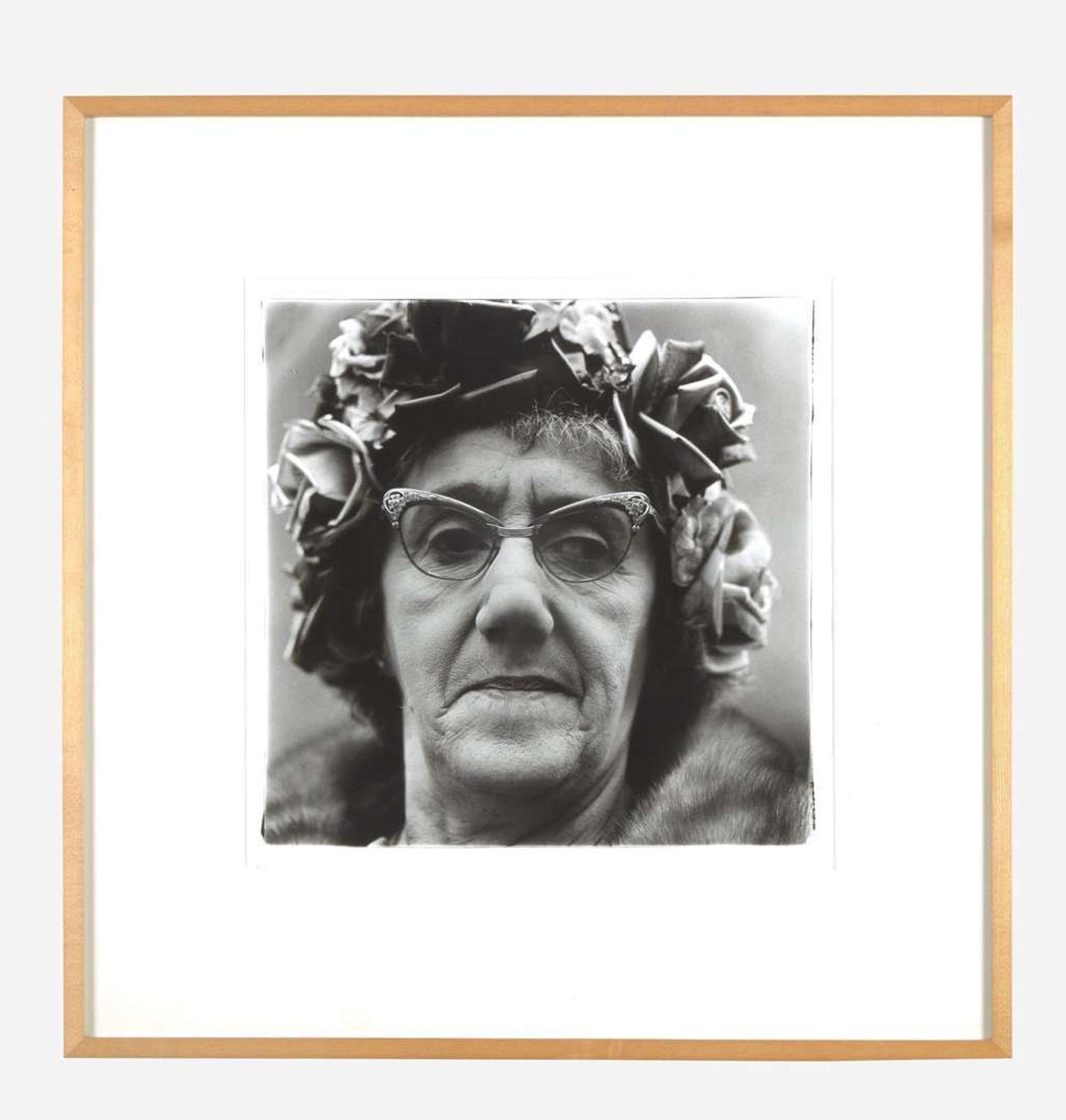 Diane Arbus (American, 1923-1971) Woman in a Rose Hat, N.Y.C.