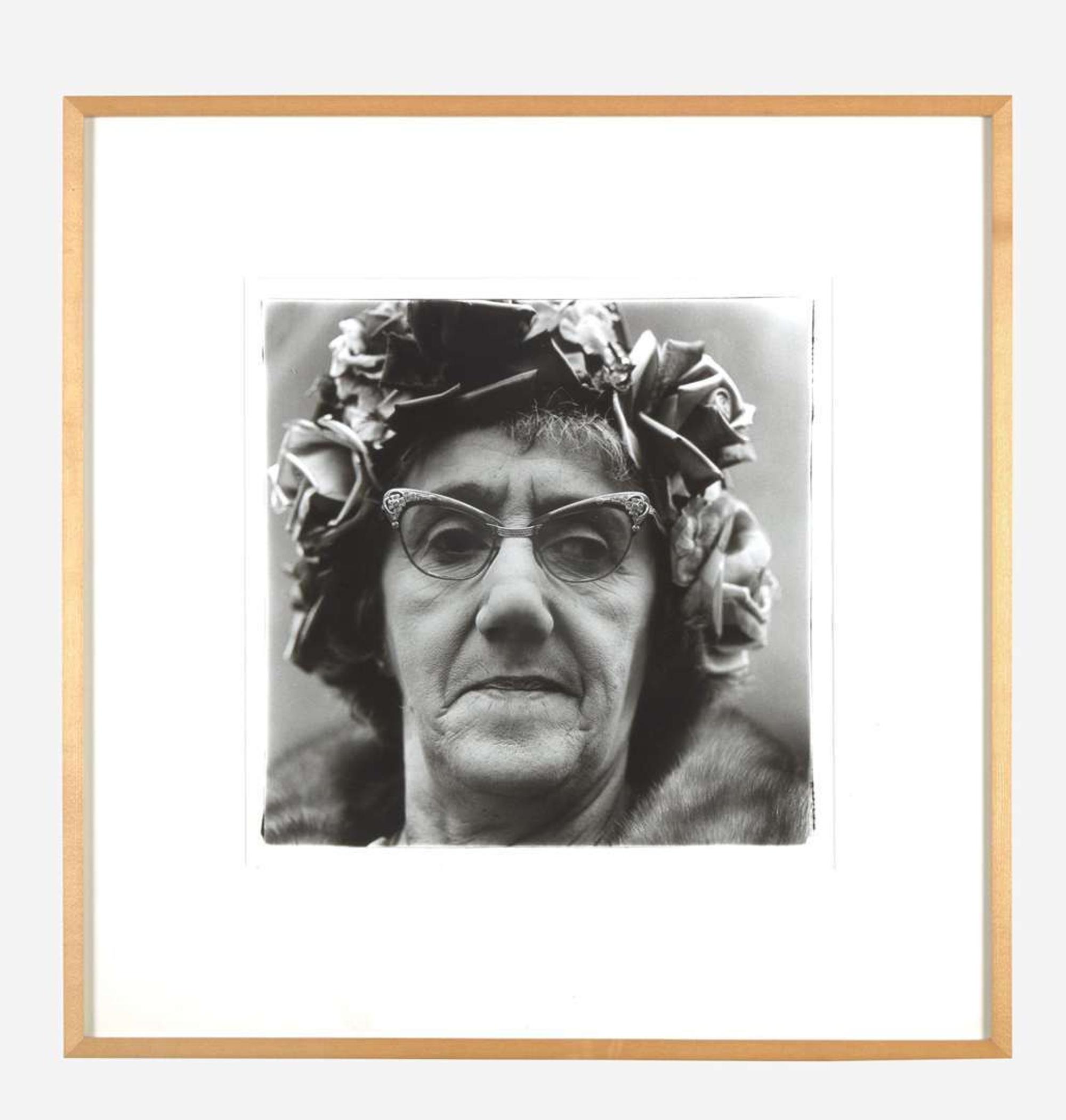 Diane Arbus (American, 1923-1971) Woman in a Rose Hat, N.Y.C.