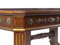 A Louis XVI Style Parcel Gilt Parquetry and Walnut Dining Table