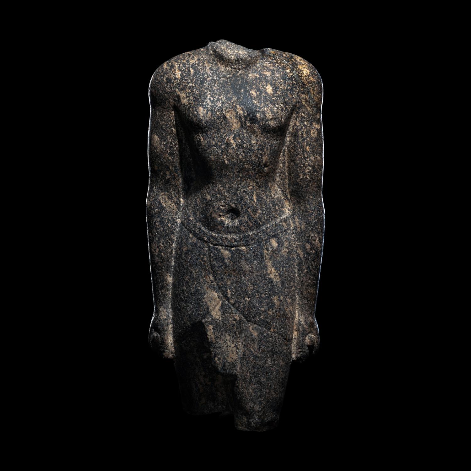 An Egyptian Granite Torso of an Official