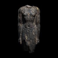 An Egyptian Granite Torso of an Official