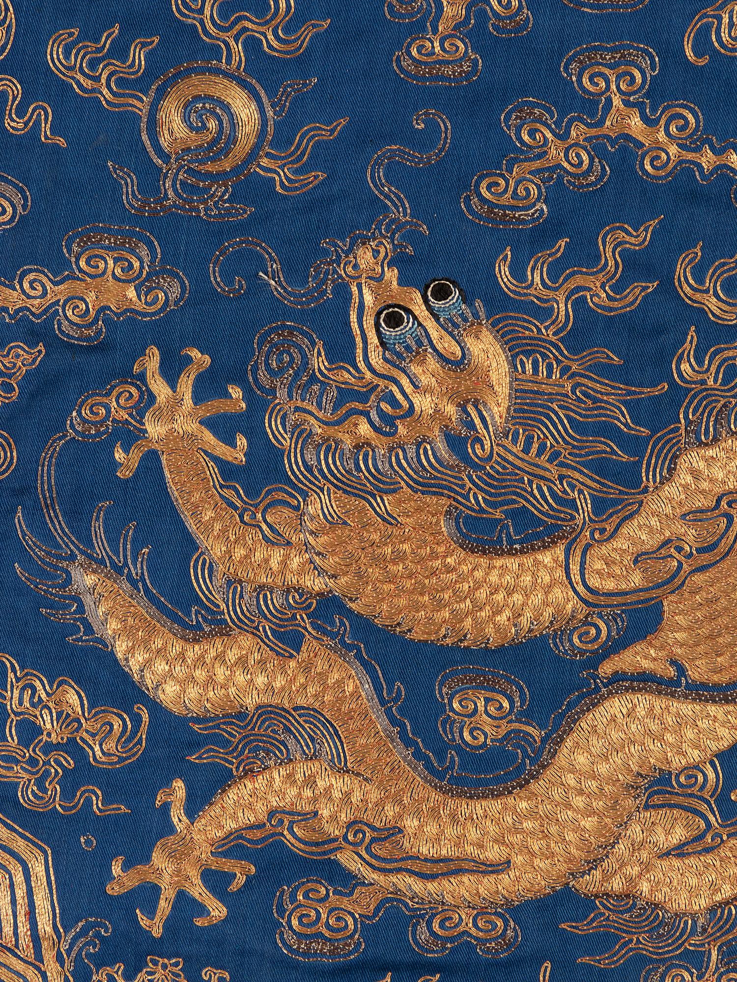 A Blue Ground Embroidered Silk Dragon Robe