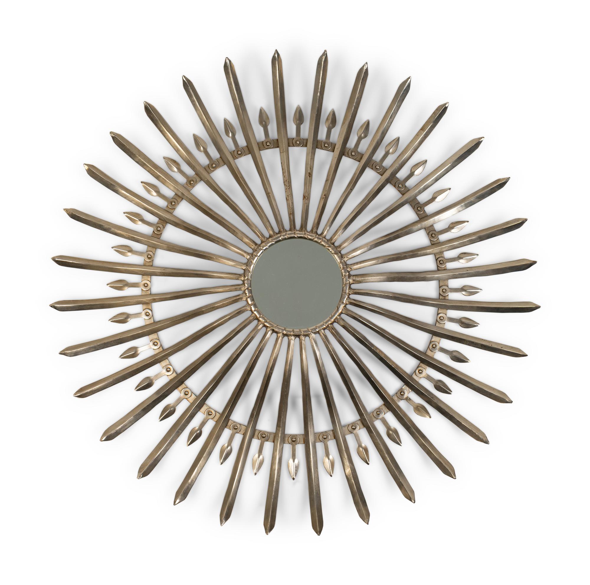 A Spanish Baroque Style Steel Sunburst Mirror — 20TH CENTURY