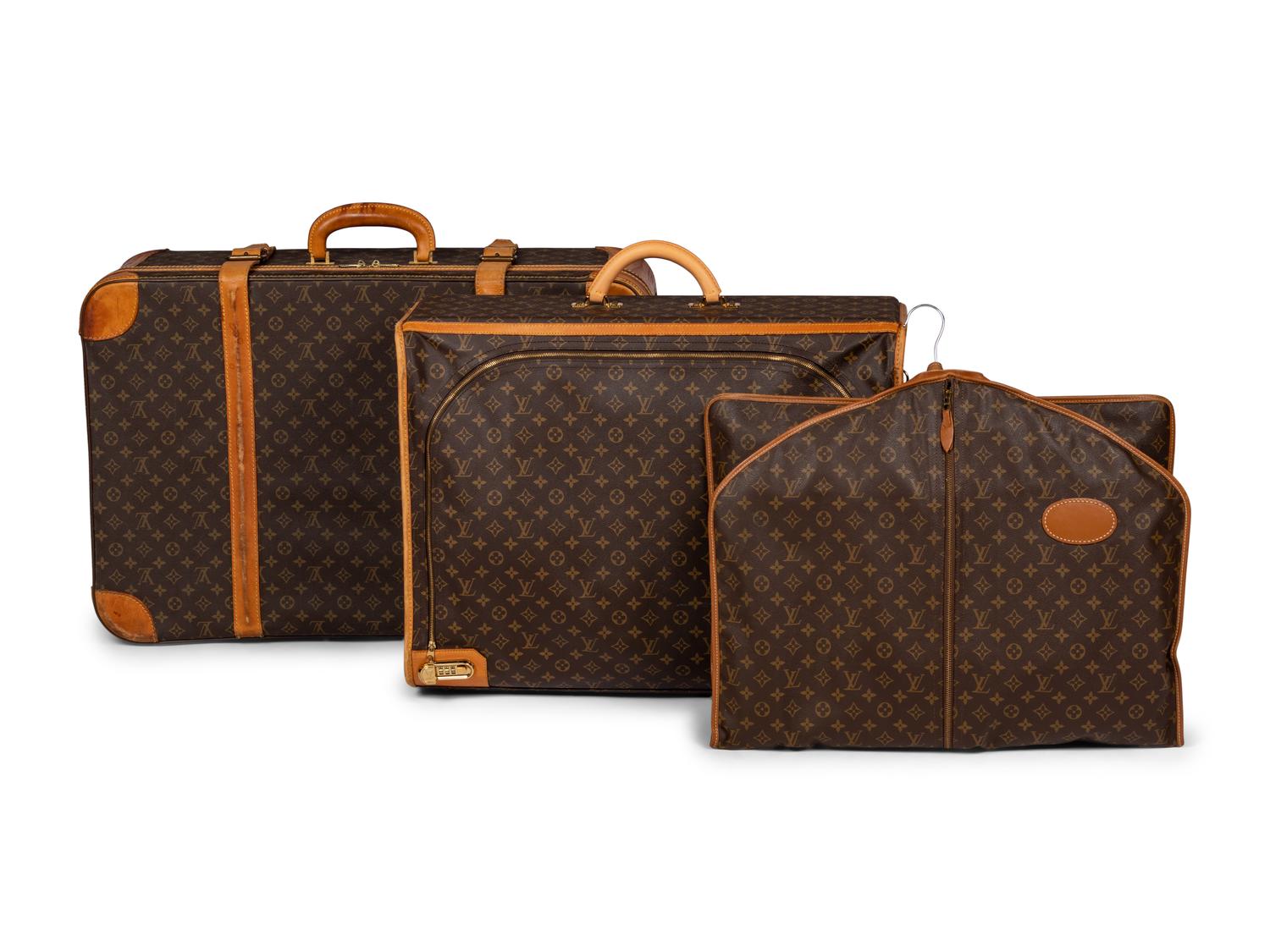Three Louis Vuitton Luggage Items