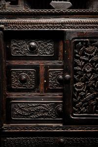 A Chinese Export Carved Hardwood Cabinet