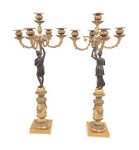 A Pair of Empire Style Gilt and Patinated Bronze Figural Five-Light Candelabra