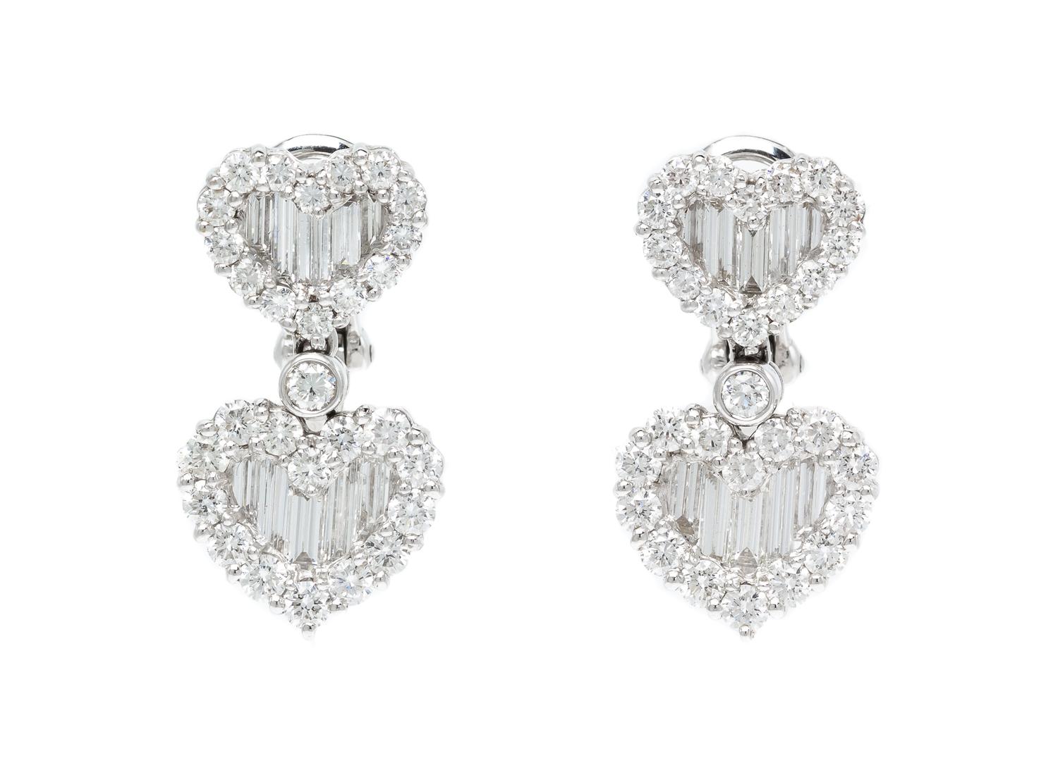 A Pair of 18 Karat White Gold and Diamond Heart Motif Earclips, 8.50 dwts.