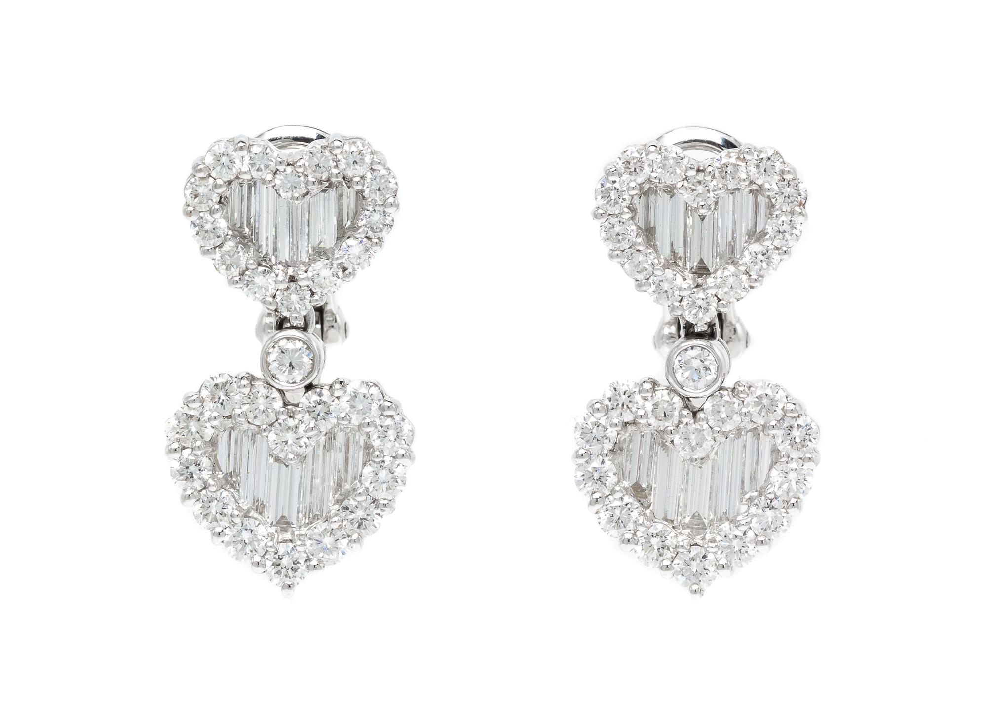 A Pair of 18 Karat White Gold and Diamond Heart Motif Earclips, 8.50 dwts.