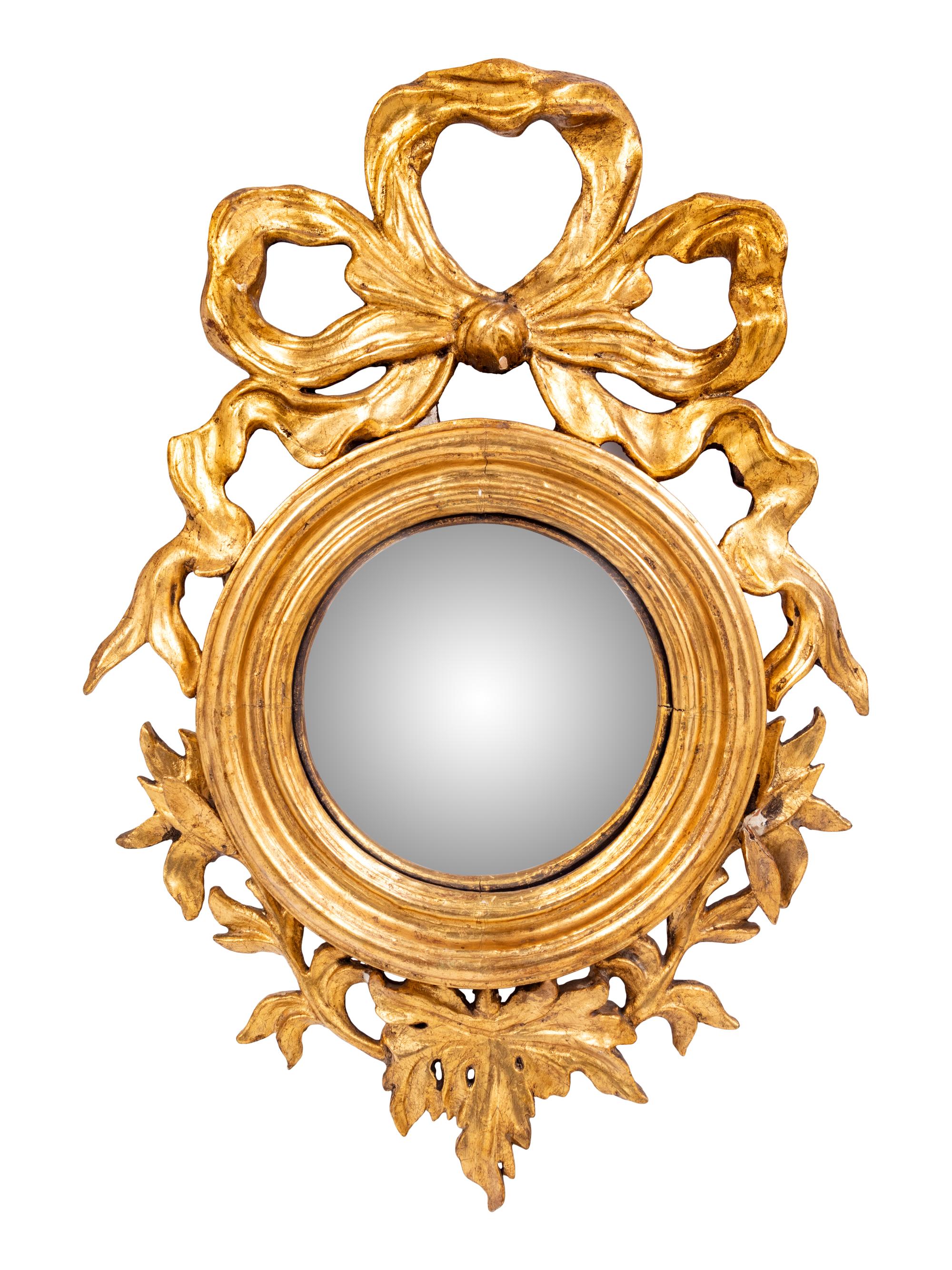A Continental Carved Giltwood Convex Mirror