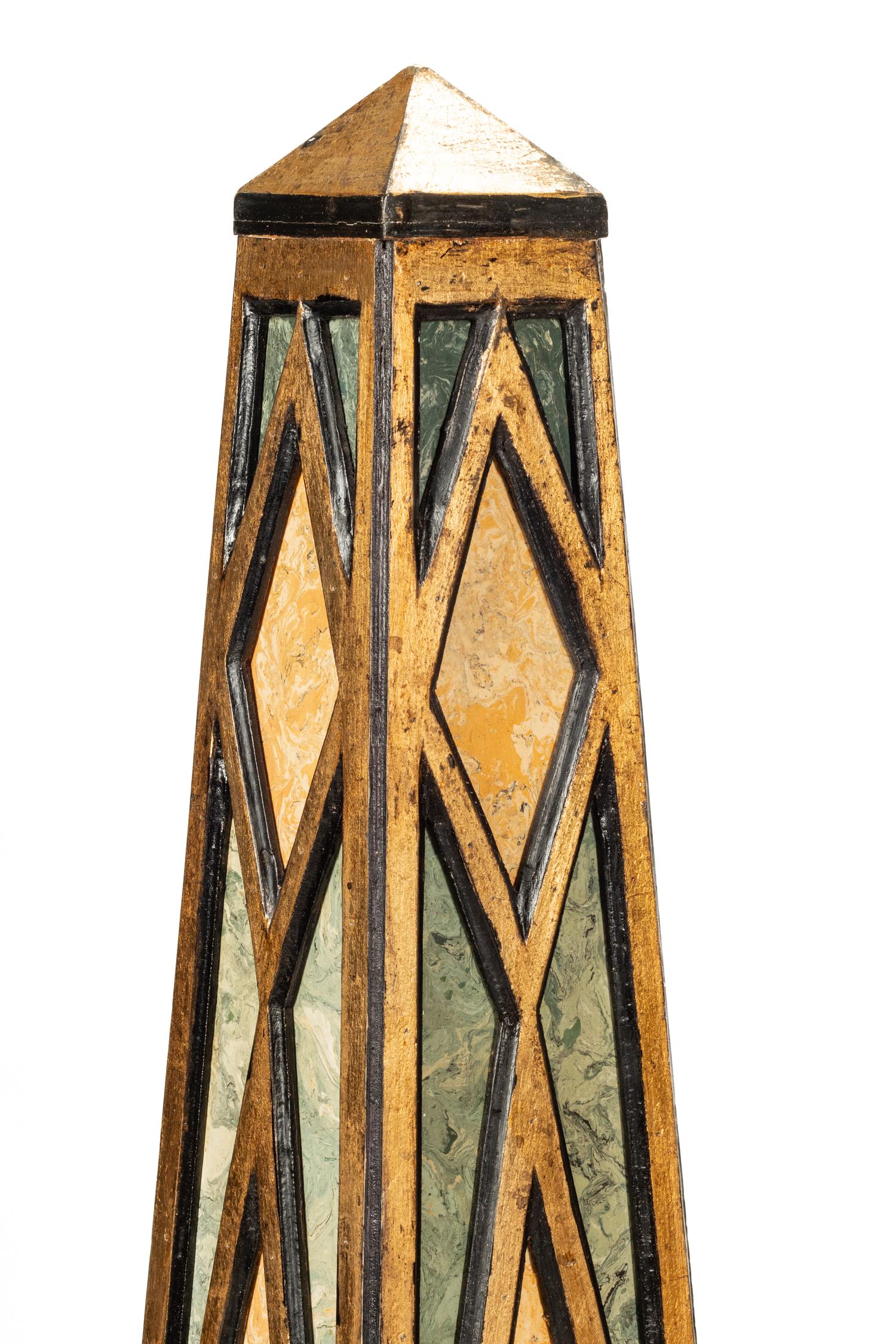 A Pair of Large Faux Marble Painted Obelisks