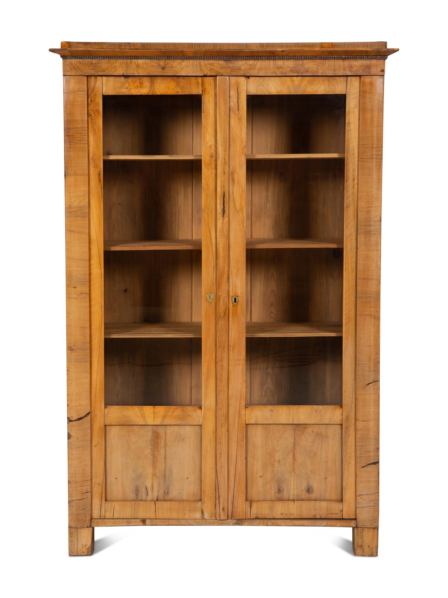 A Pair of Biedermeier Figured Birch Bookcases