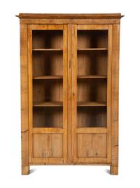 A Pair of Biedermeier Figured Birch Bookcases