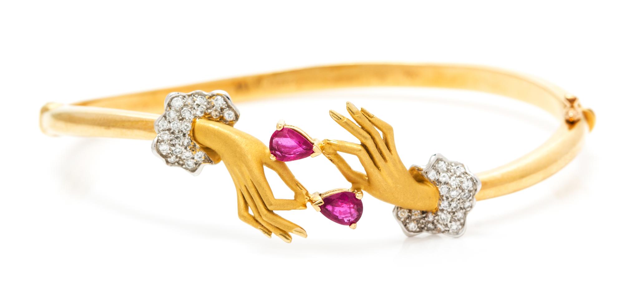 An 18 Karat Yellow Gold, Diamond and Ruby Hand Motif Bracelet, Carrera y Carrera, 12.80 dwts.