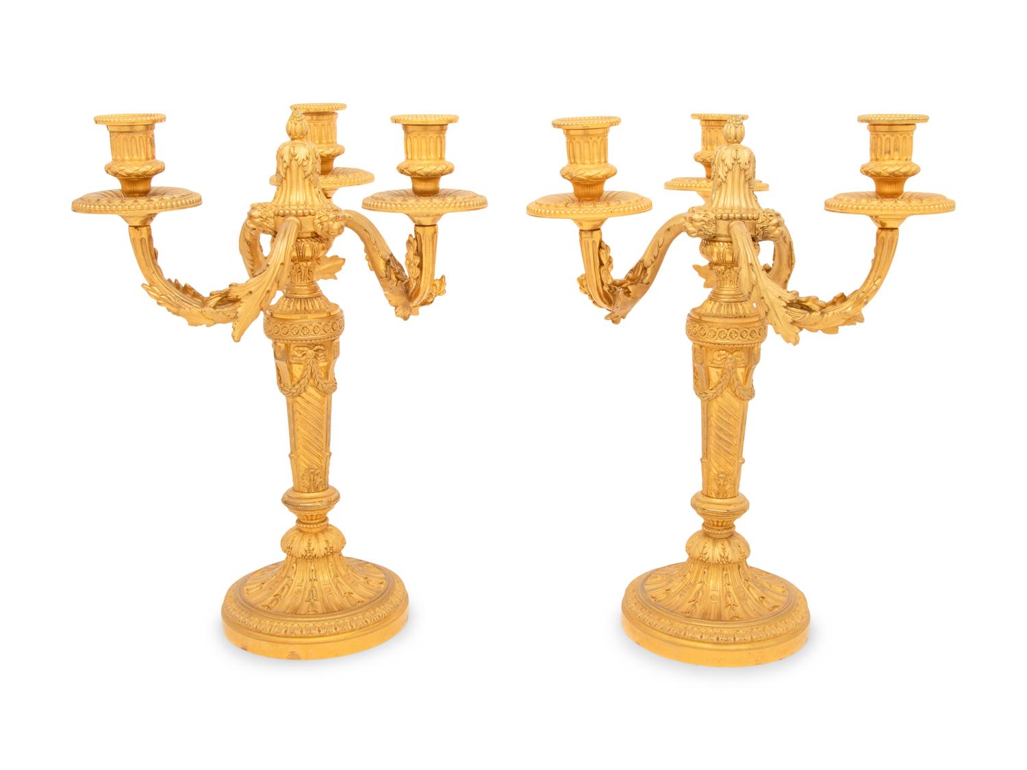 A Pair of Louis XVI Style Gilt Bronze Three-Light Candelabra