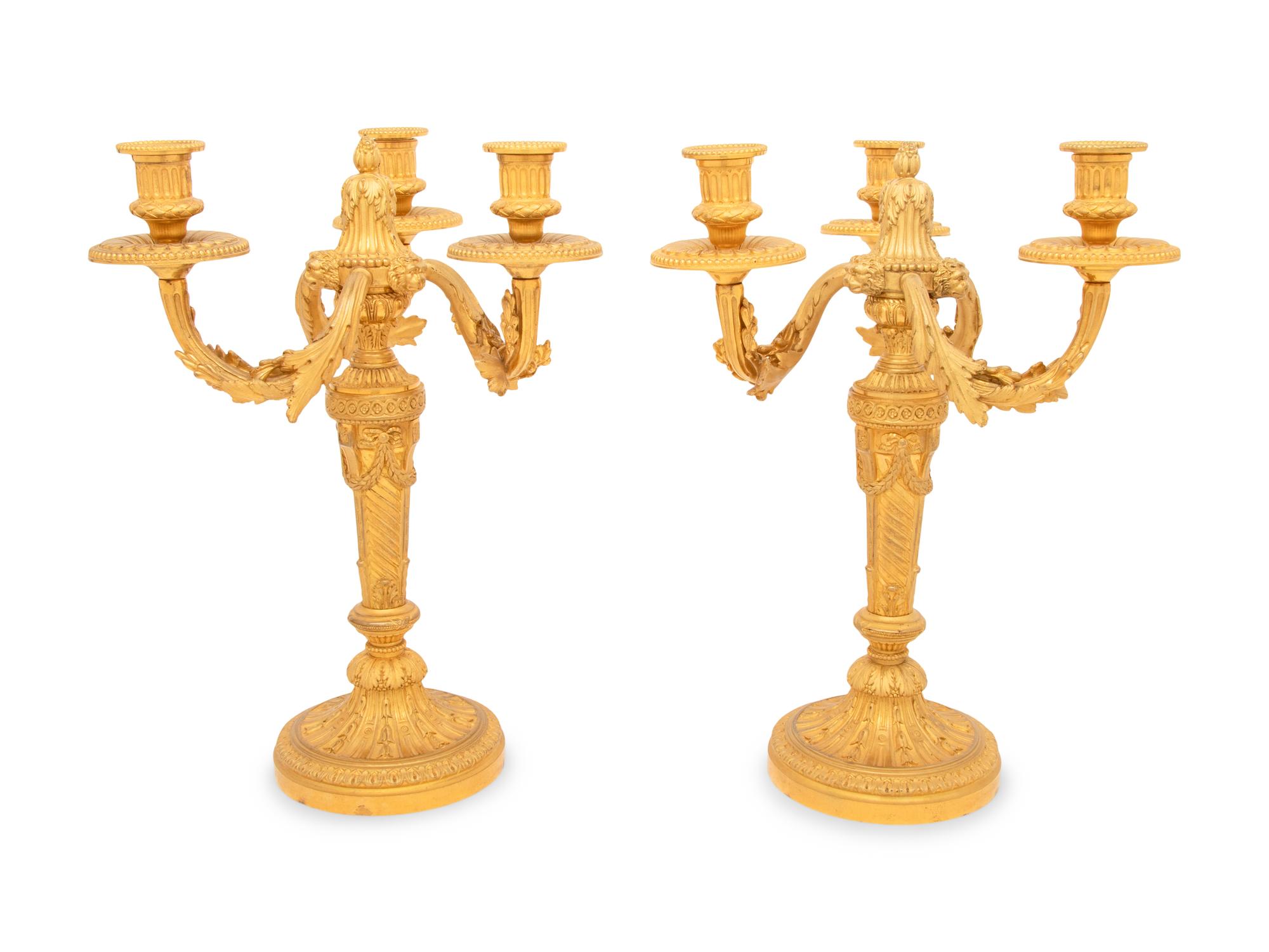 A Pair of Louis XVI Style Gilt Bronze Three-Light Candelabra
