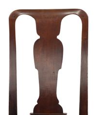 An Assemblage of Five Queen Anne Cherry and Mahogany Dining Chairs