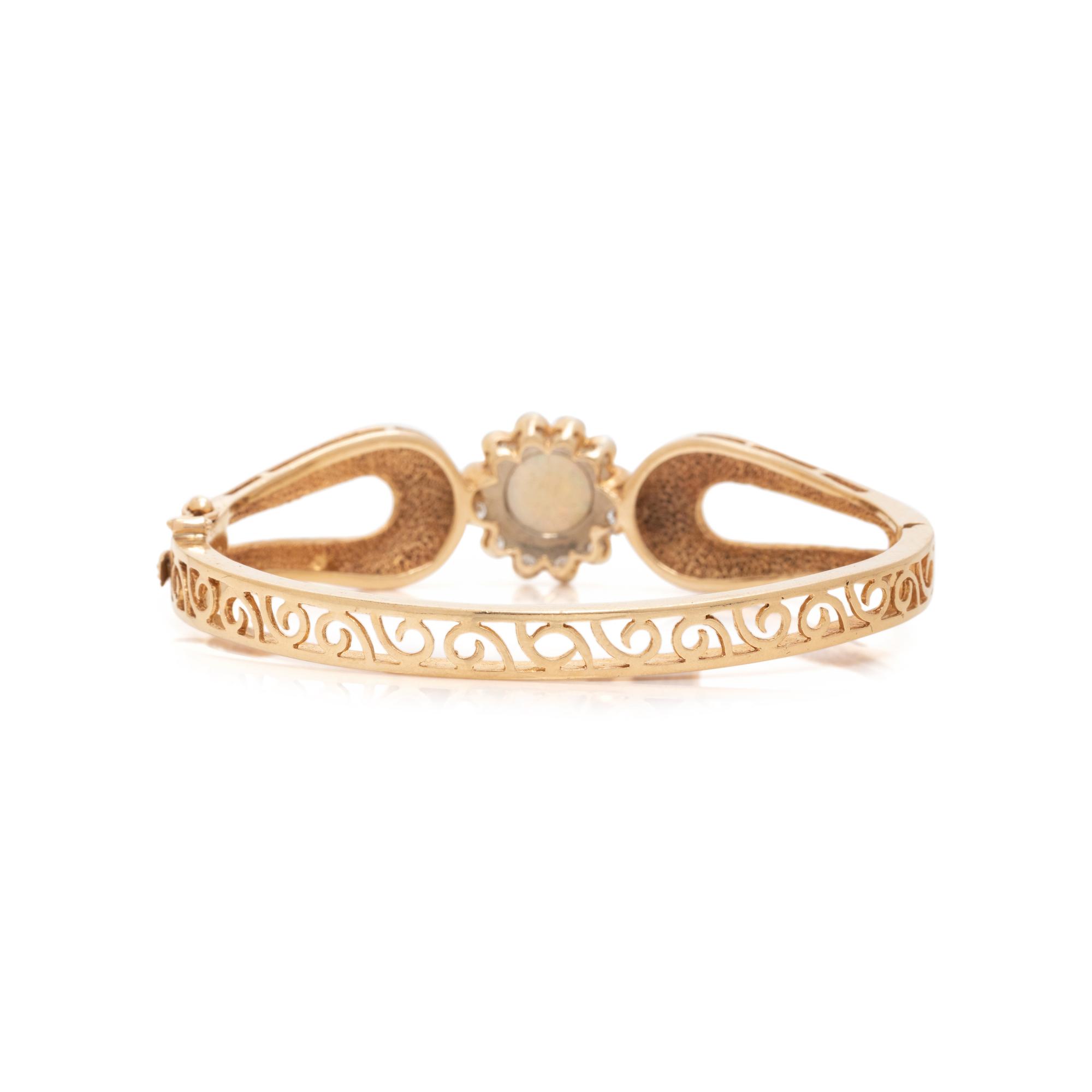 LA TRIOMPH, OPAL AND DIAMOND BANGLE BRACELET