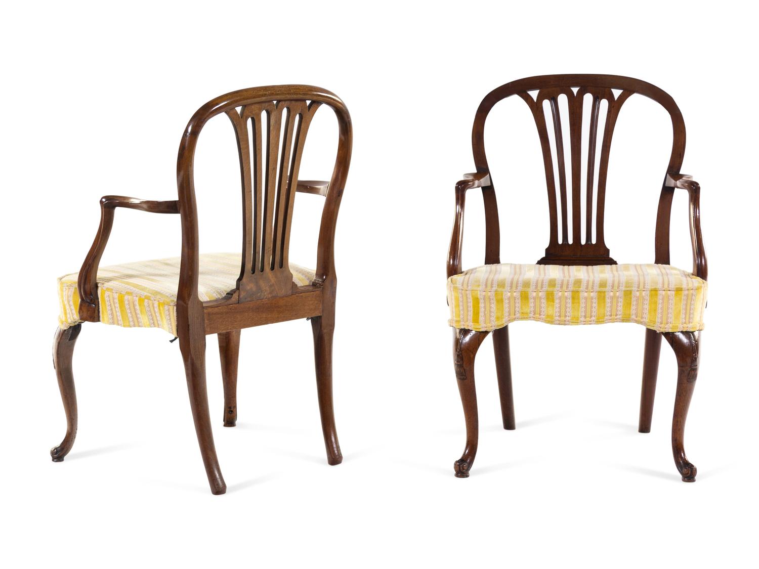 A Pair of George Ill Tassel-Carved Mahogany Scroll-Foot Armchairs
