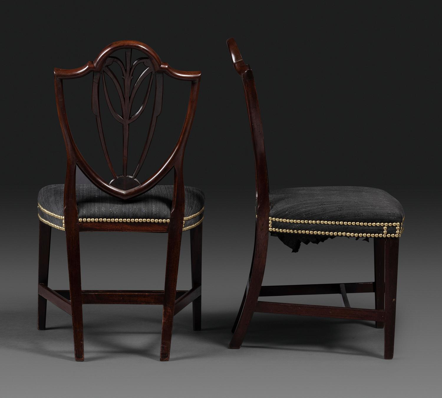 A Pair of Federal Carved Mahogany Shield-Back Dining Chairs