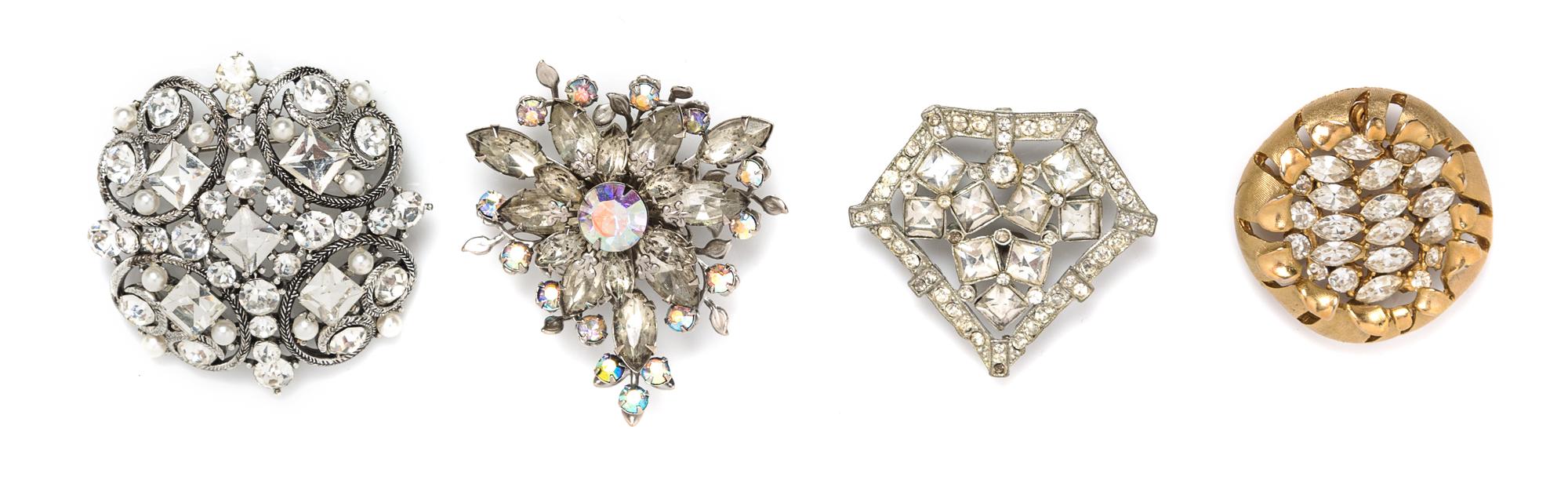 A Collection of Four Rhinestone Brooches,