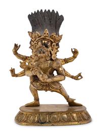A Small Tibetan Gilt Bronze Figure of Rakta Yamari