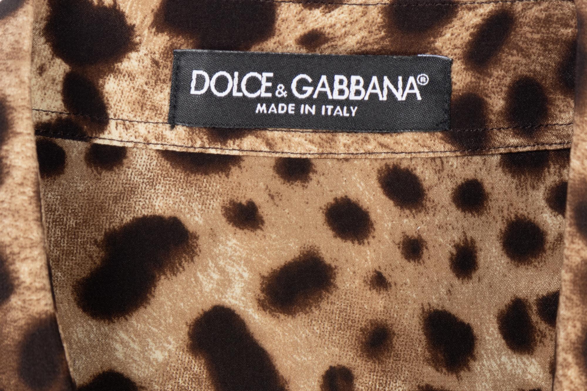 Five Designer Tops: One Carolina Herrera, One Loro Piana, One Dolce and Gabbana, One Burberry, and One The Row