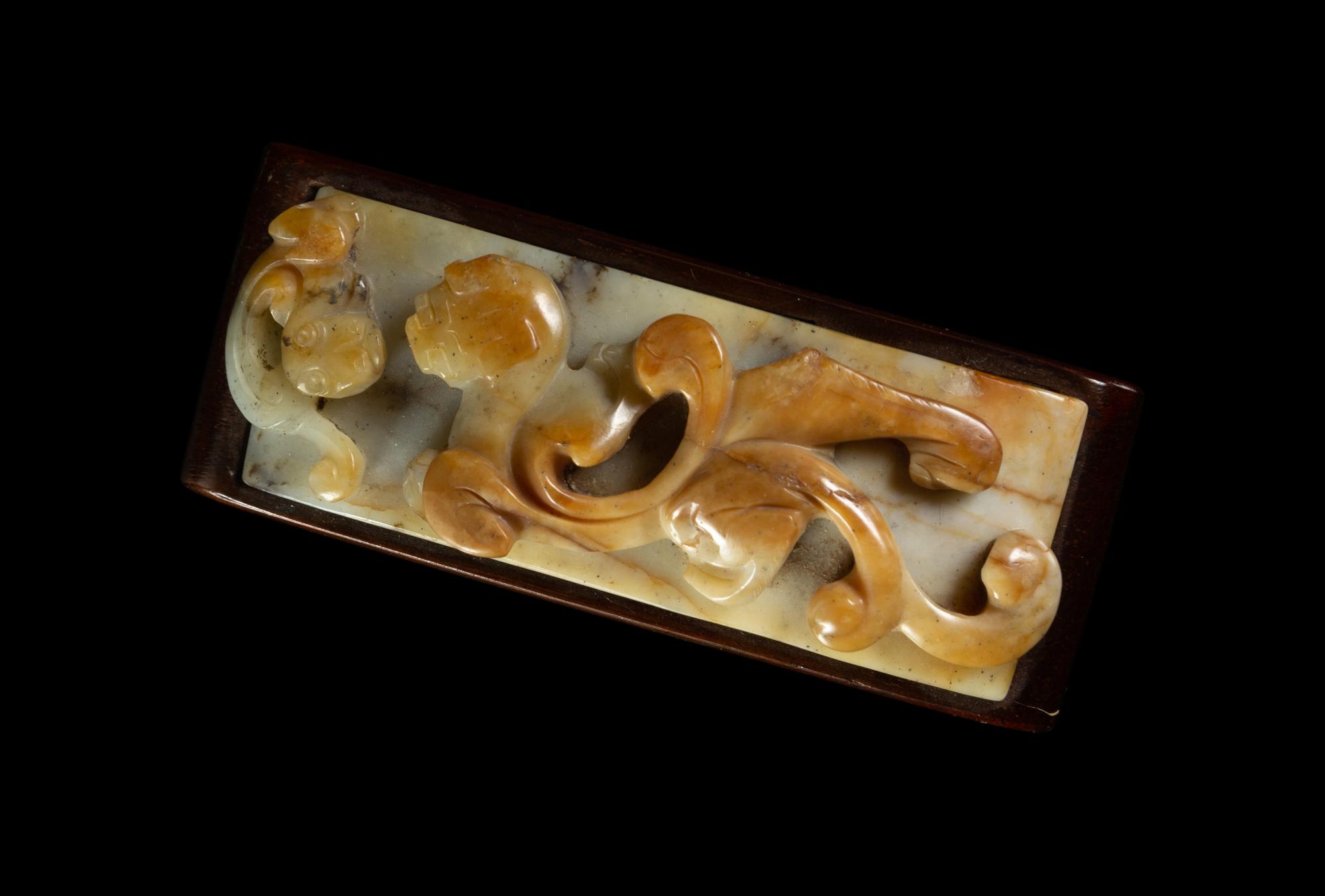A Chicken Bone Jade Sword Slide
