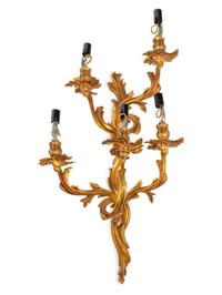 A Set of Four Louis XV Style Gilt Metal Five-Light Sconces