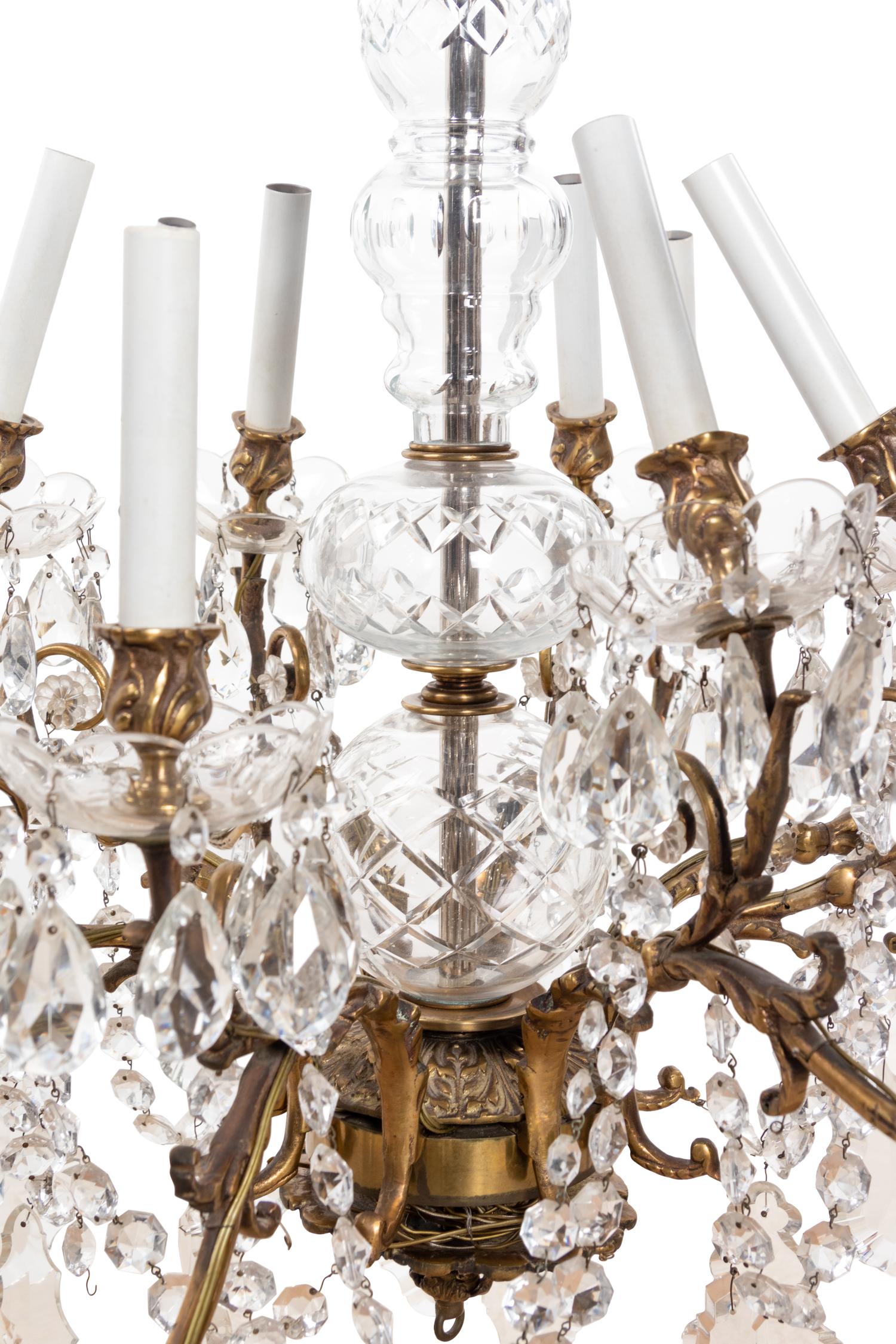 A Brass and Cut Glass Sixteen-Light Chandelier