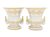 A Pair of French Parcel Gilt Porcelain Campagna Urns