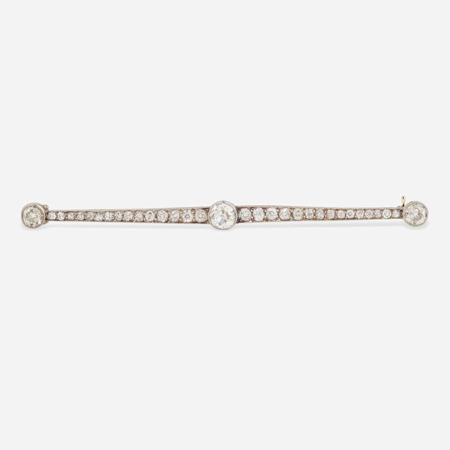 A Platinum, Yellow Gold, and Diamond Bar Pin Edwardian, c.1915
