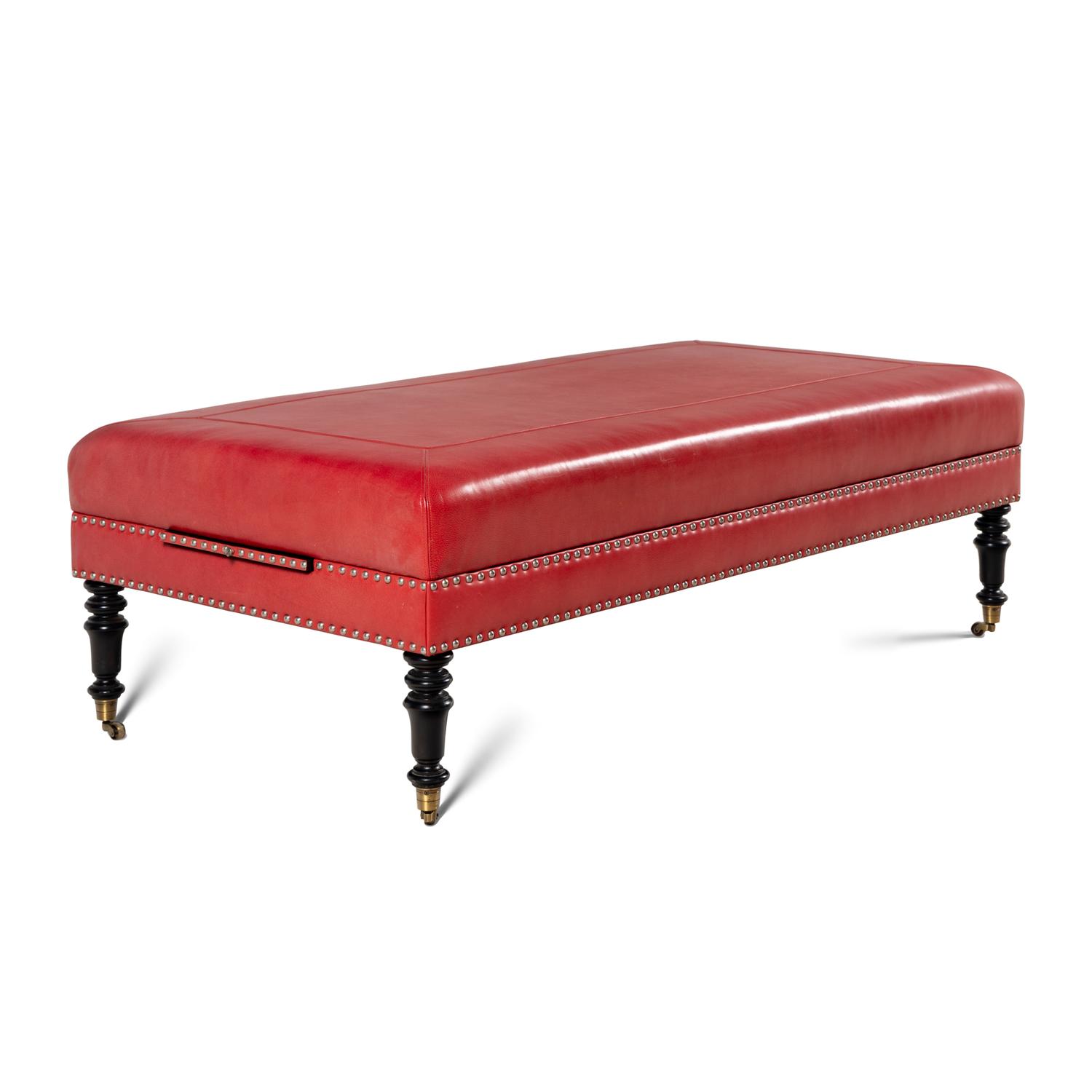 A Custom Coral Leather Upholstered Ottoman