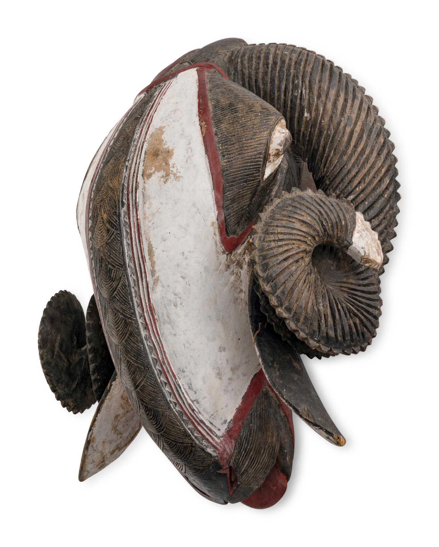 An African Carved and Painted Wood Ram's Head