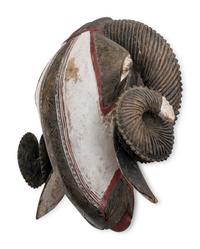 An African Carved and Painted Wood Ram's Head
