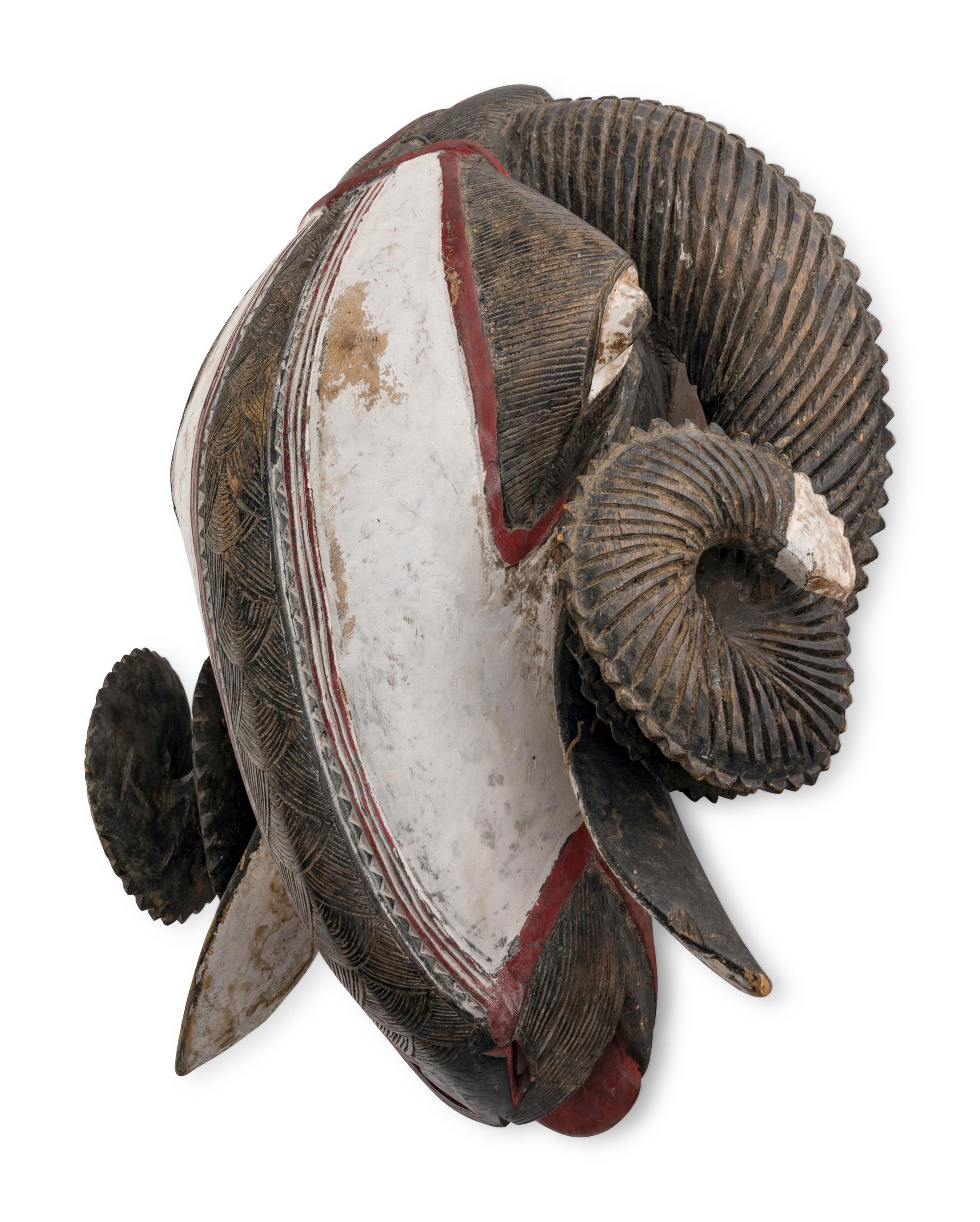 An African Carved and Painted Wood Ram's Head