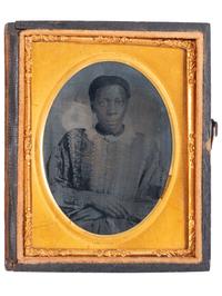 [EARLY PHOTOGRAPHY]. A pair of ninth plate tintypes of African American women.