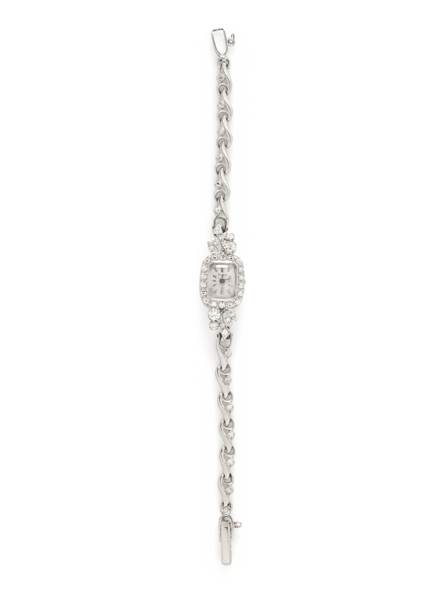 BULOVA, 14K WHITE GOLD AND DIAMOND WATCH