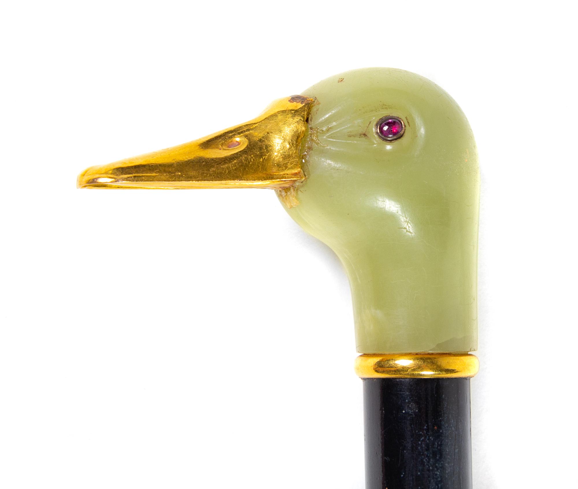 A French 18-Karat Gold, Gemstone and Carved Agate Mounted Walking Stick Length 35 inches. — LATE 19TH/EARLY 20TH CENTURY