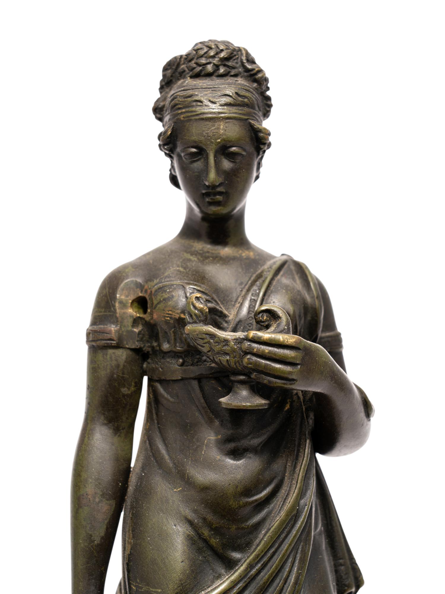 An Empire Patinated Bronze and Ormolu Figure of a Vestal Virgin