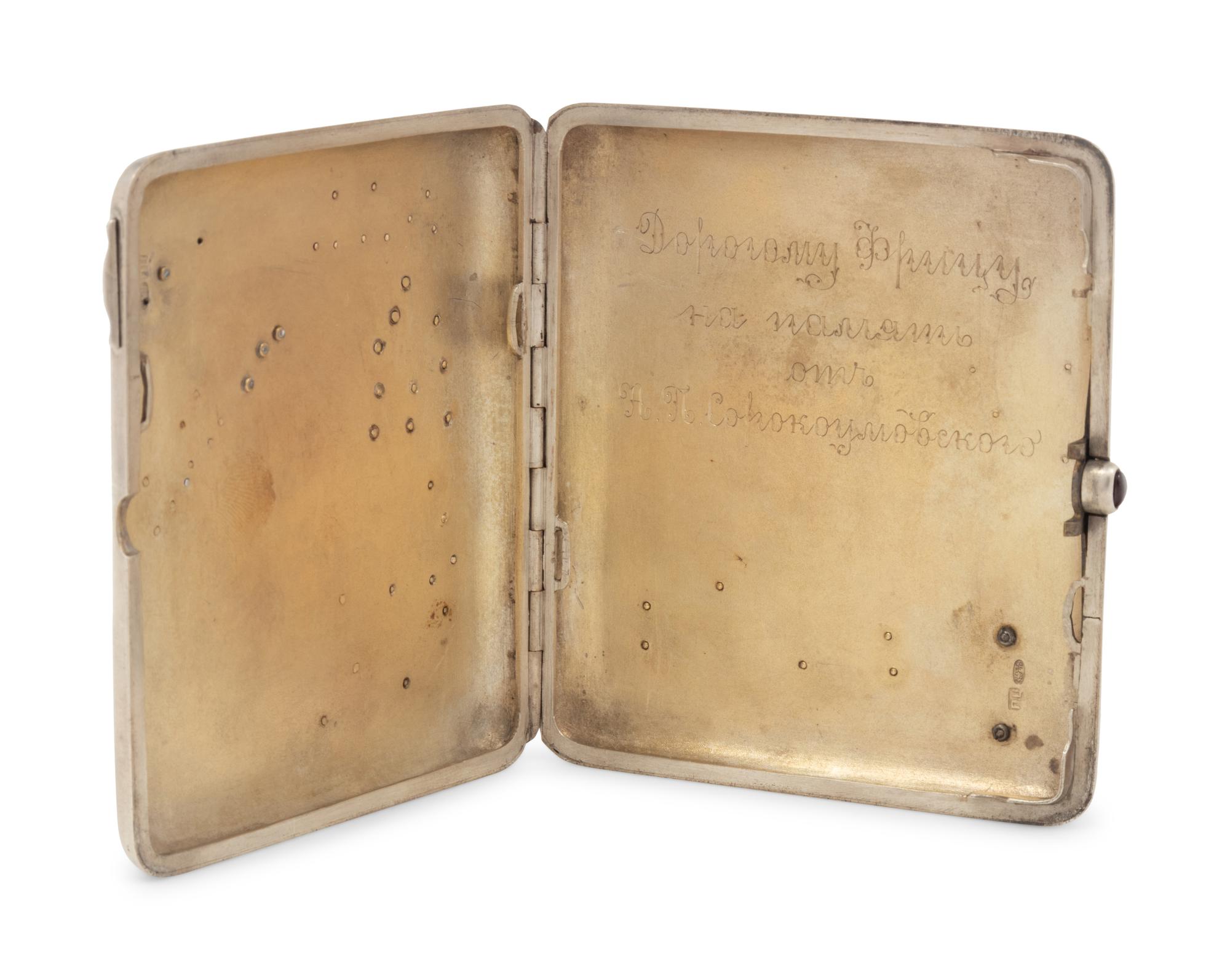 A Russian Gold, Enamel and Diamond Charm Mounted Silver Cigarette Case