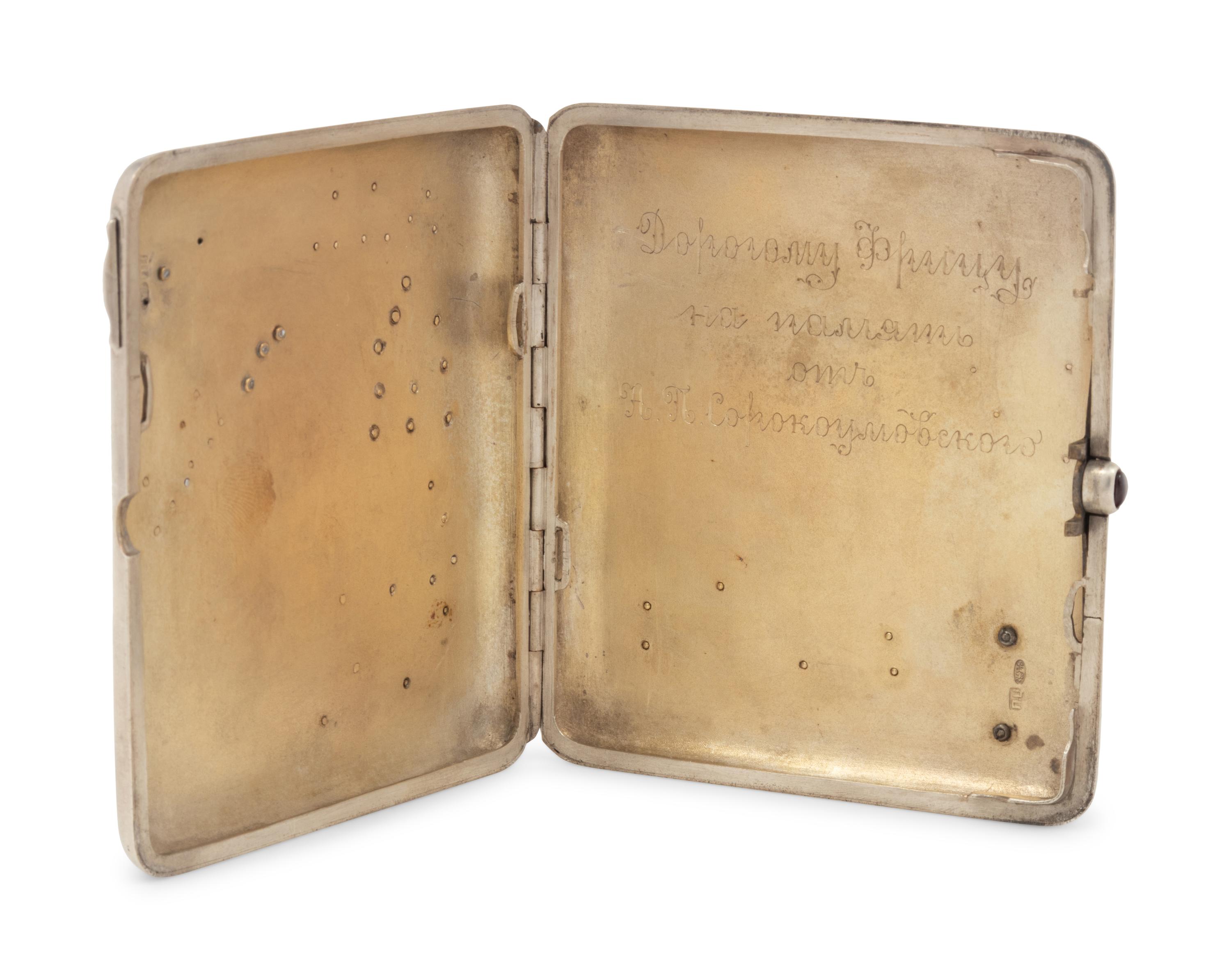A Russian Gold, Enamel and Diamond Charm Mounted Silver Cigarette Case